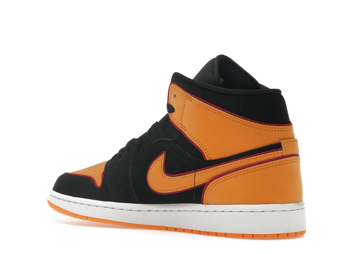 Vue 23 de Jordan 1 Mid Fat Tongue Black Orange
